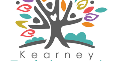 Kearney Enrichment Council Logo - Colorful graphic tree with words underneath. Working together to improve the quality of life in Kearney.