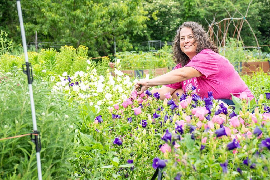 Michele Vaughan works in a flower field.